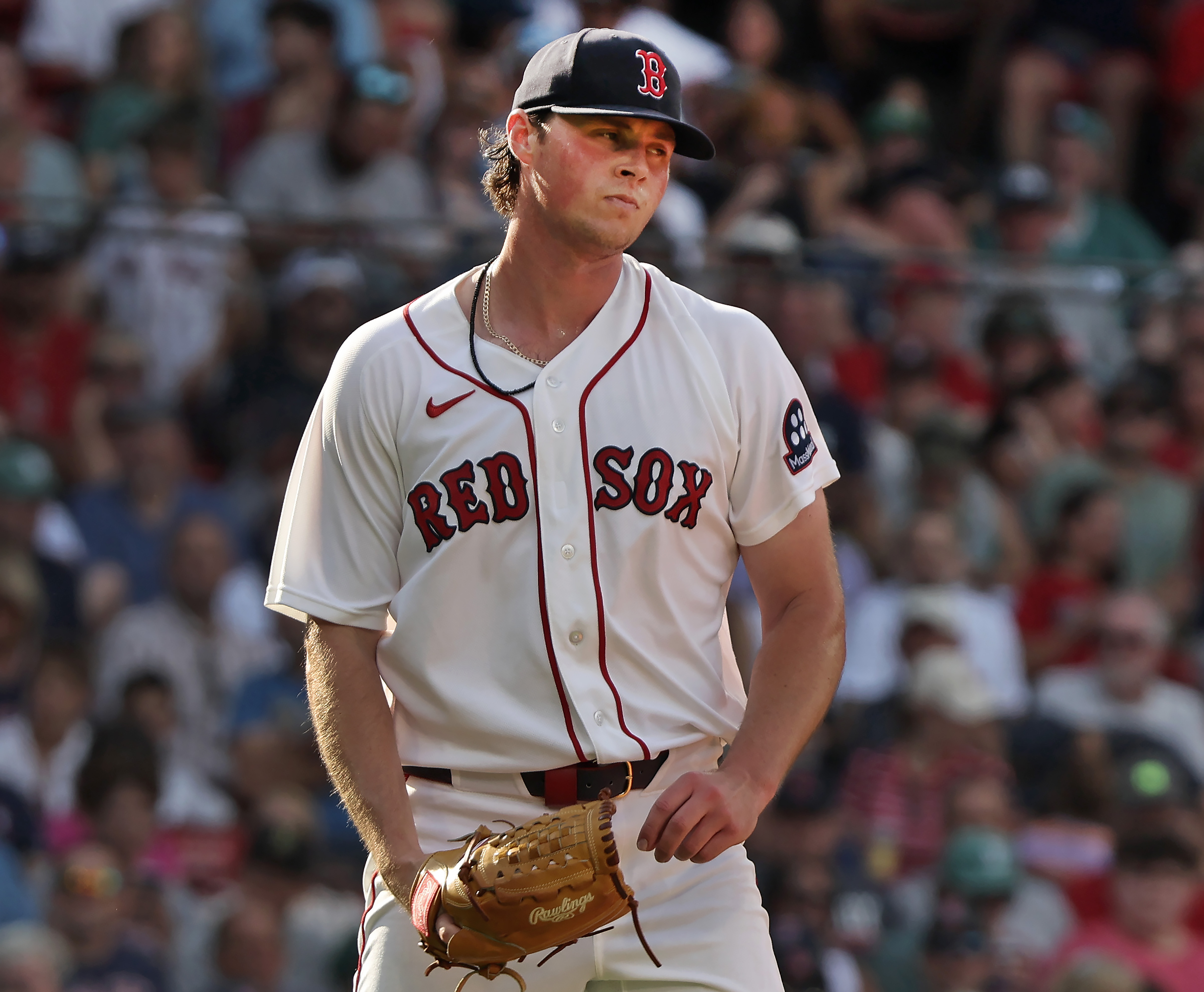 Boston Red Sox pitcher Jake Bennett reacts after giving up a run in the fifth inning of a baseball game against the Athletics, Saturday, Aug. 8, 2026 in Boston. 