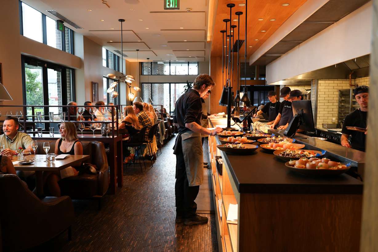 Urban Hill staff prepare to serve customers. Chef Nick Zocco teamed up with fellow chef Viet Pham for a special one-night collaboration.