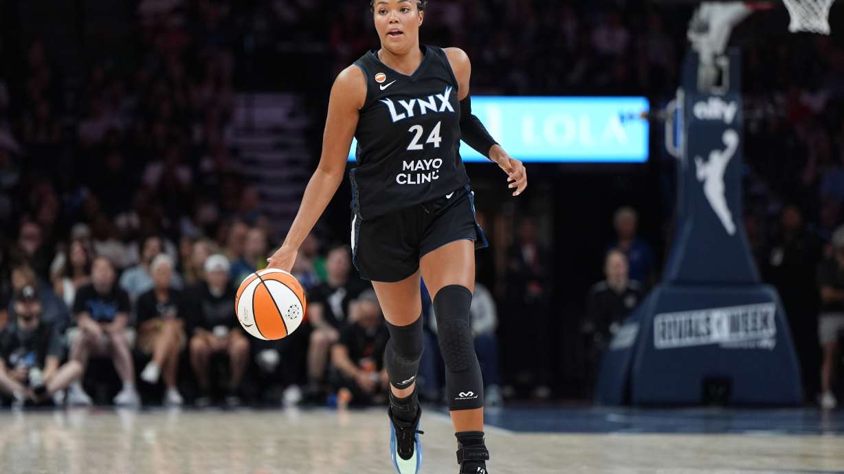 Minnesota Lynx forward Napheesa Collier dribbles down the court during the first half of a WNBA basketball game against the Las Vegas Aces in Minneapolis, Saturday, Aug. 8, 2026.