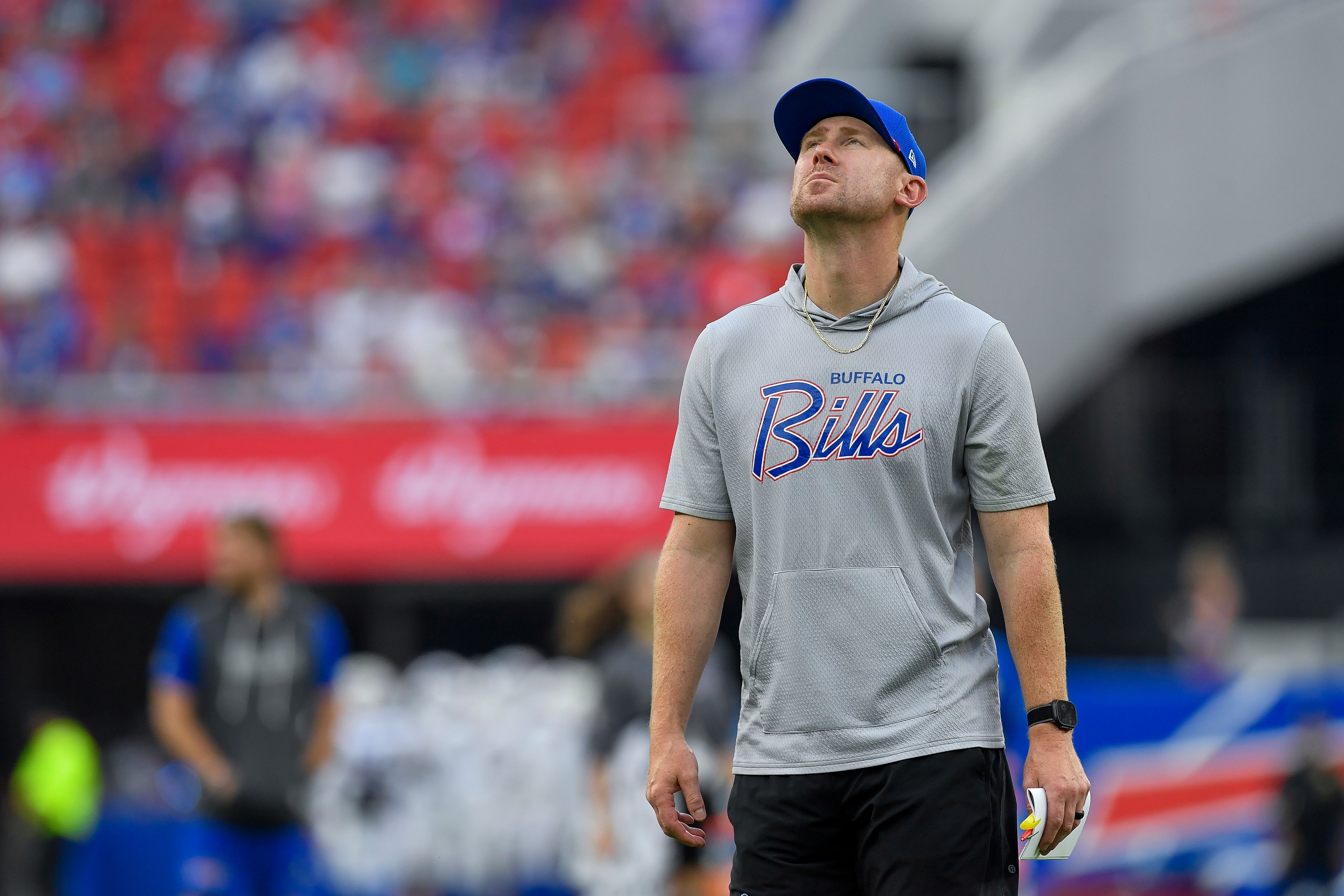 Buffalo Bills head coach Joe Brady looks around the stadium during practice at the team's NFL football training camp Saturday, Aug. 8, 2026, in Orchard Park, N.Y. 