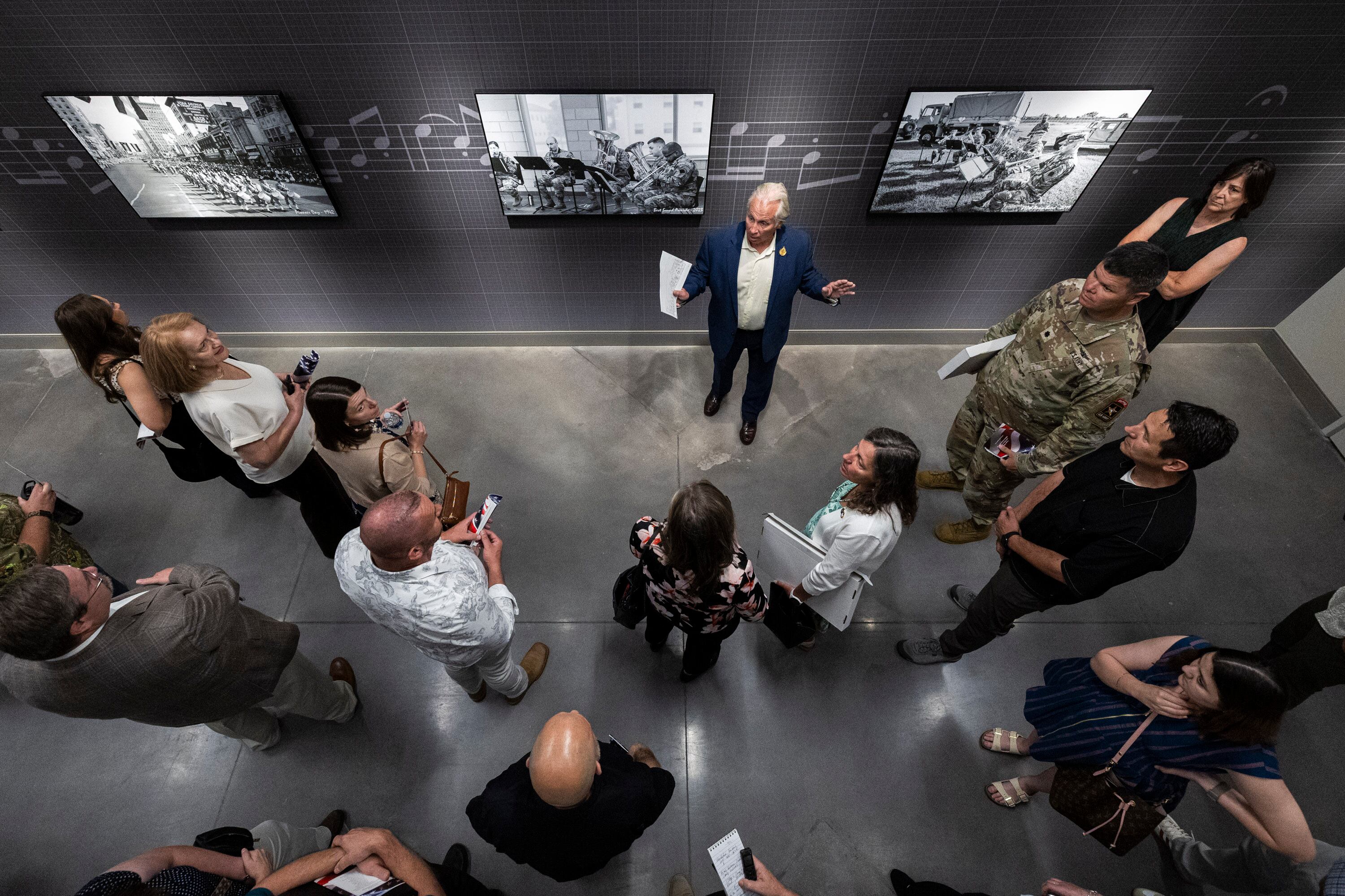 Mark Flumerfelt, a project manager and representative with the Army Reserves, leads a tour of the Camp Williams "Deadeye" Army Reserve Center in Bluffdale on Saturday.