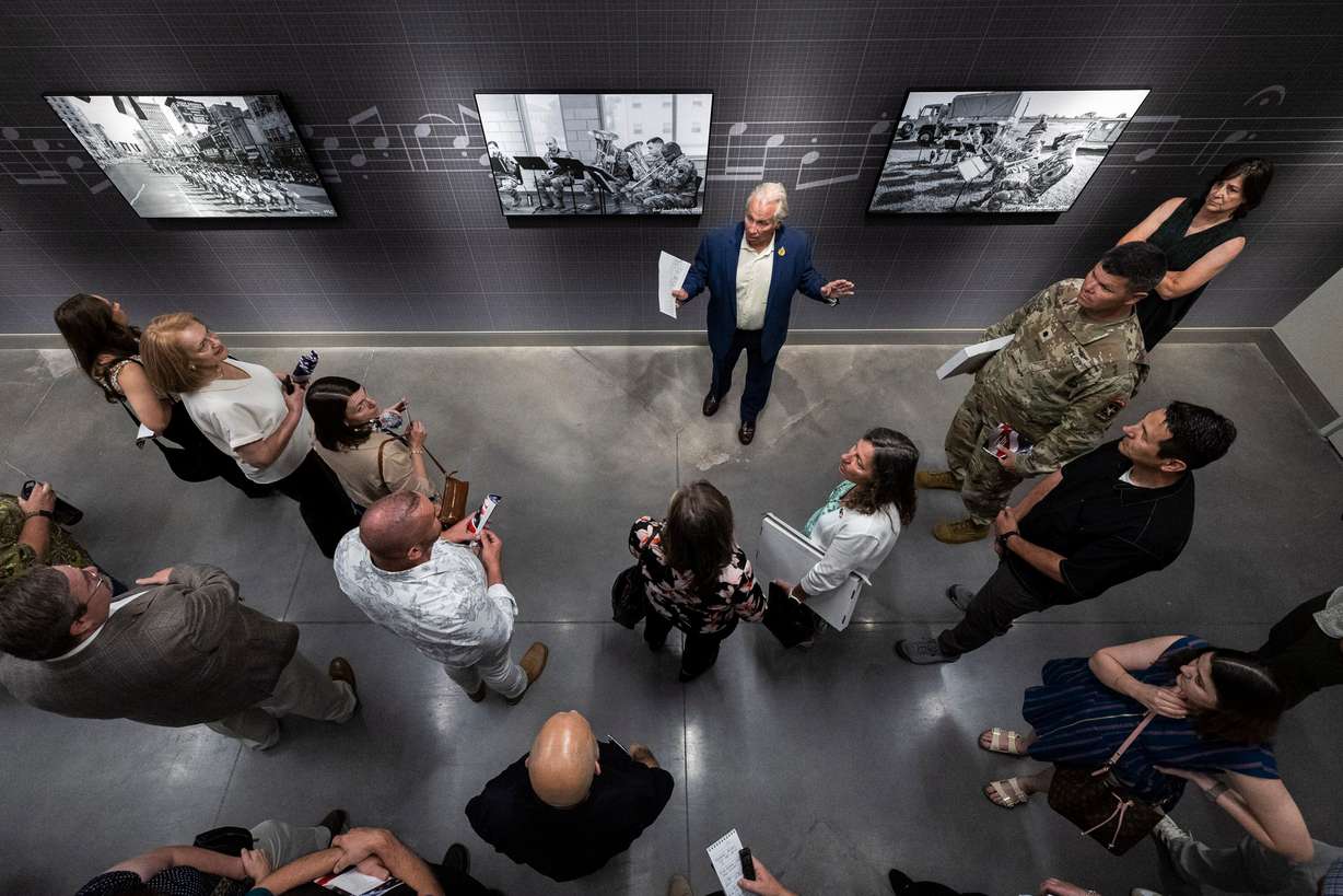 Mark Flumerfelt, a project manager and representative with the Army Reserves, leads a tour of the Camp Williams "Deadeye" Army Reserve Center in Bluffdale on Saturday.
