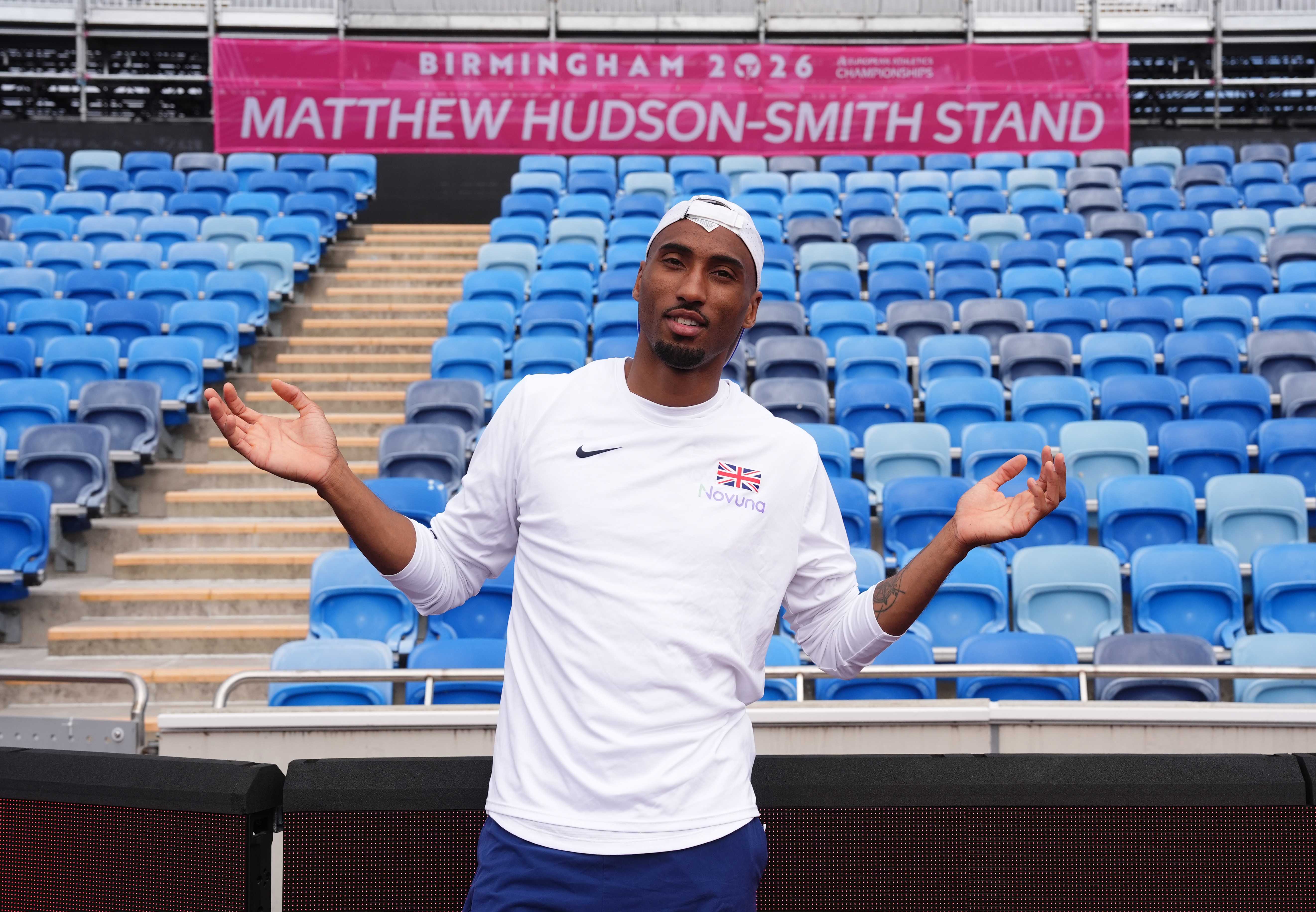 Britain's Matthew Hudson-Smith poses in front of a stand named after him, during a training session ahead of the start of the European Athletics Championships, in Birmingham, England, Sunday, Aug. 9, 2026. 