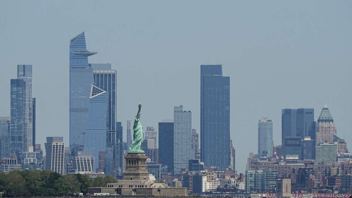 The New York skyline and Statue of Liberty are seen on May 12, 2025. The operator of a boat that capsized in New York Harbor, killing a mother and her infant daughter, is facing criminal charges and authorities are investigating whether the vessel was an illegal charter, the U.S. Coast Guard said Sunday.