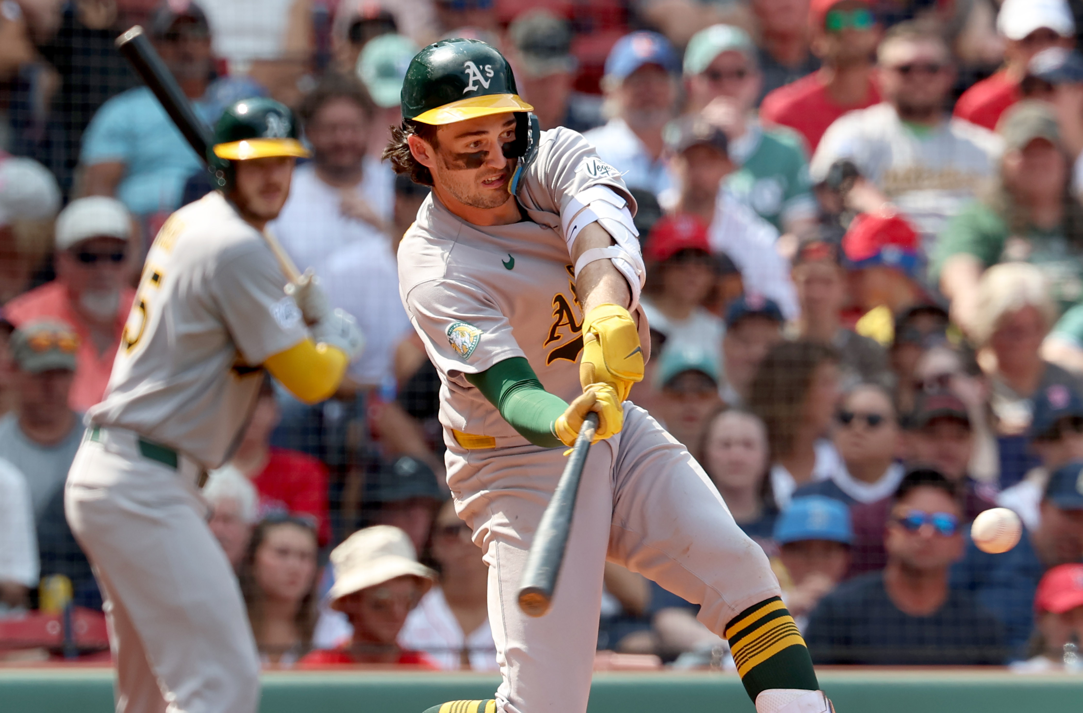 Athletics' Jacob Wilson takes a strike swinging during the fifth inning of a baseball game against the Boston Red Sox, Sunday, Aug. 9, 2026, in Boston. 