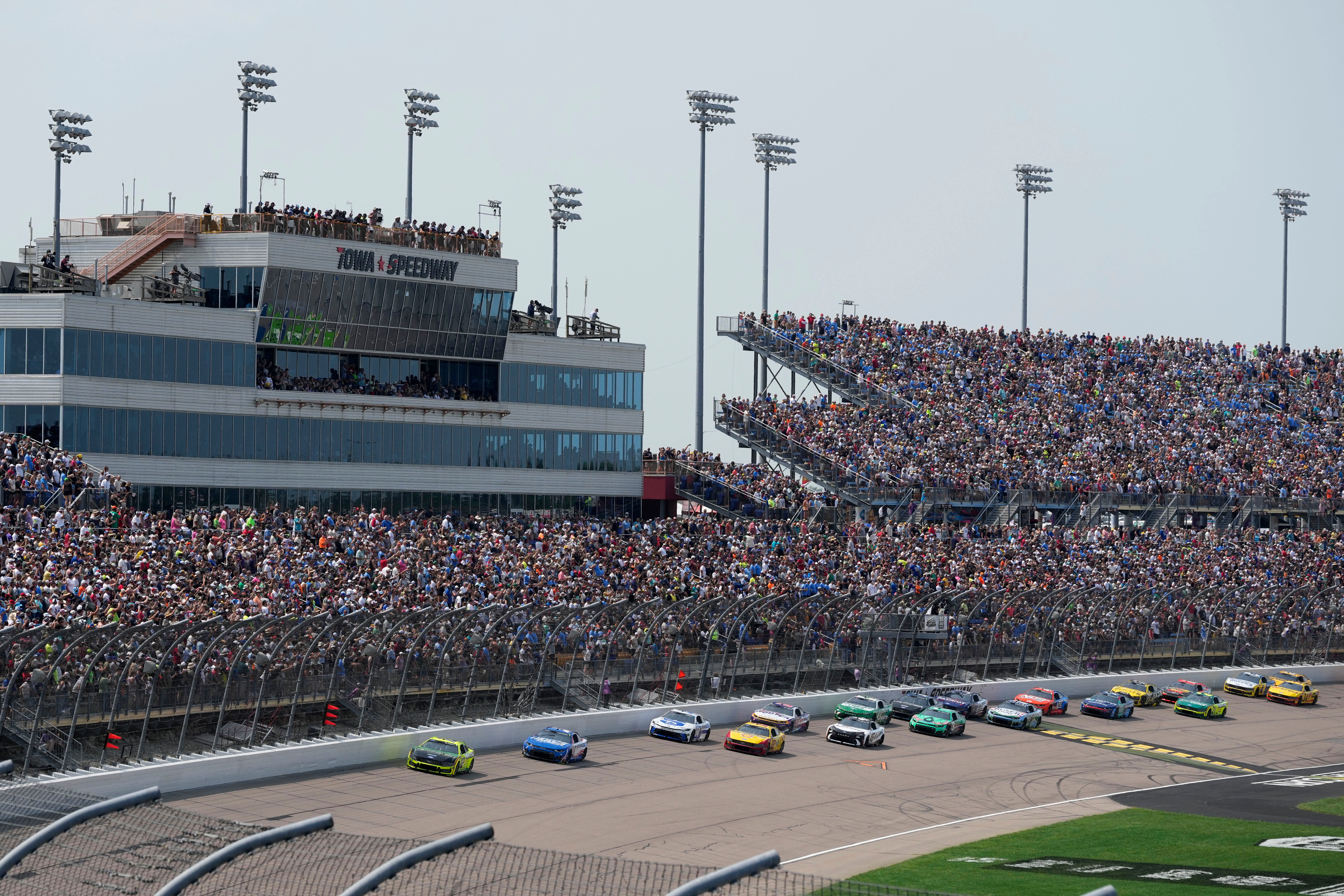 Ryan Blaney leads the field at the start of a NASCAR Cup Series auto race, Sunday, Aug. 9, 2026, at Iowa Speedway in Newton, Iowa. 