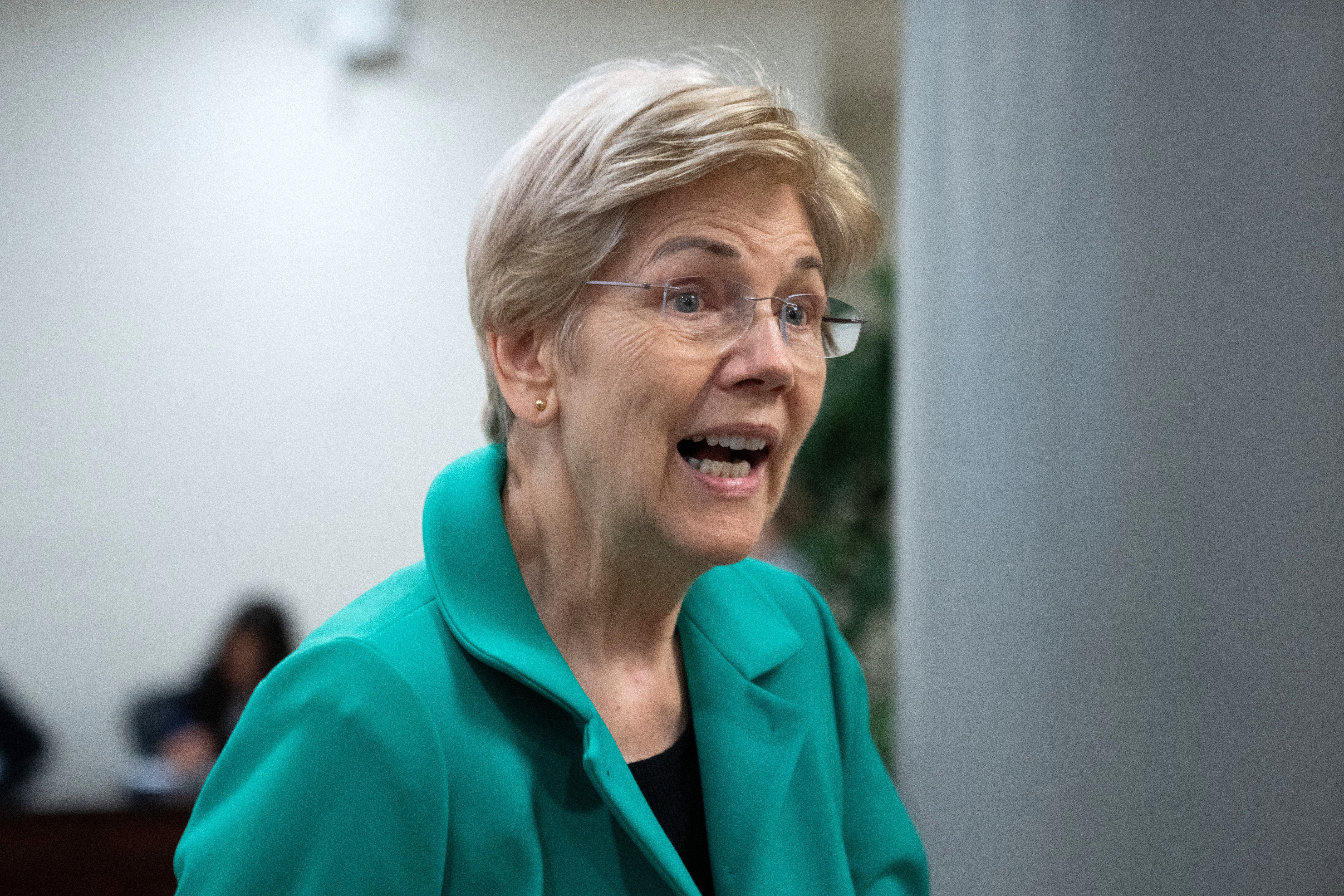 Sen. Elizabeth Warren, D-Mass., walks through the Capitol during votes in Washington, July 16.