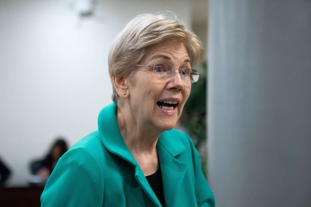 Sen. Elizabeth Warren, D-Mass., walks through the Capitol during votes in Washington, July 16.