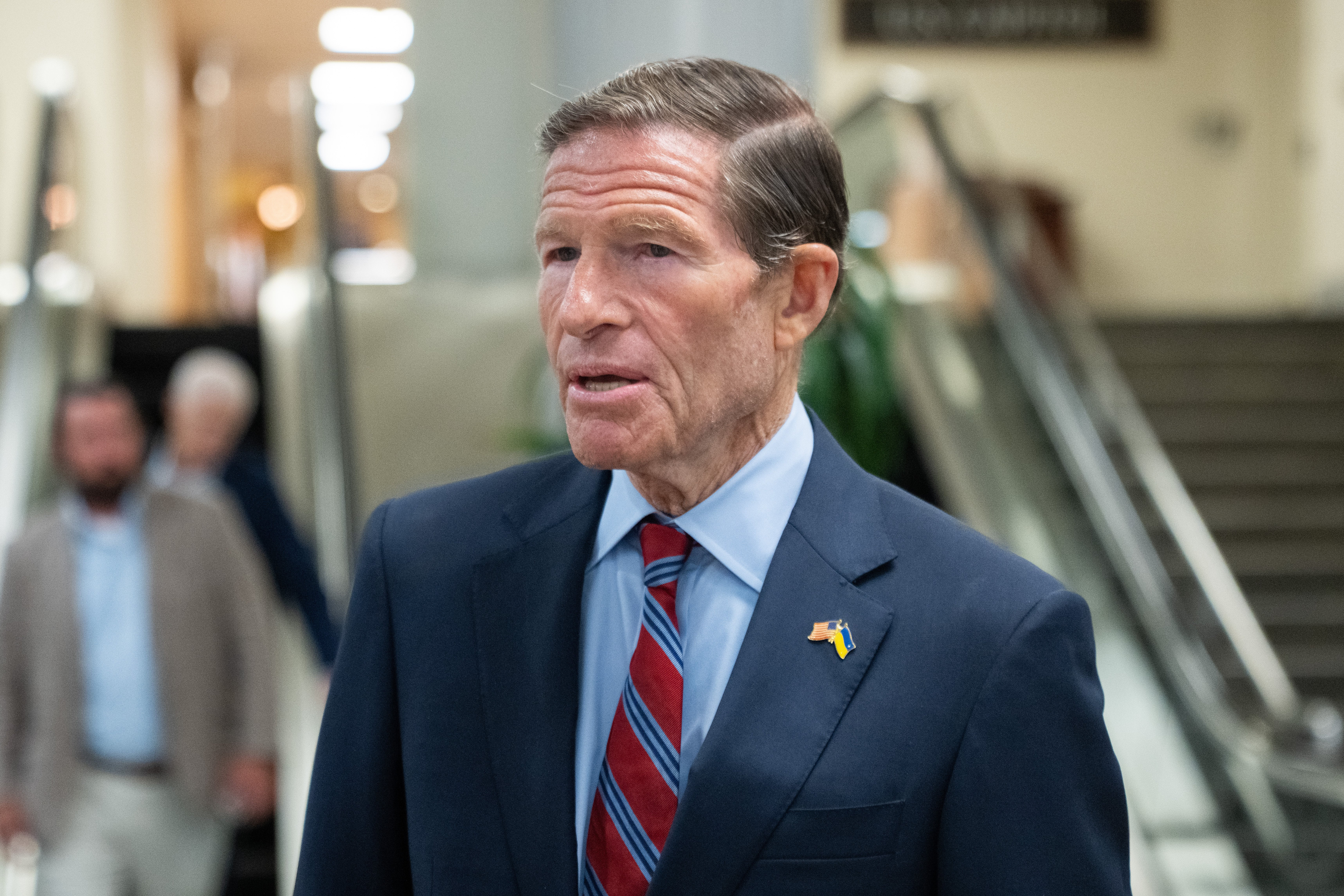 Sen. Richard Blumenthal, D-Conn., walks through the Capitol during votes in Washington, July 16.