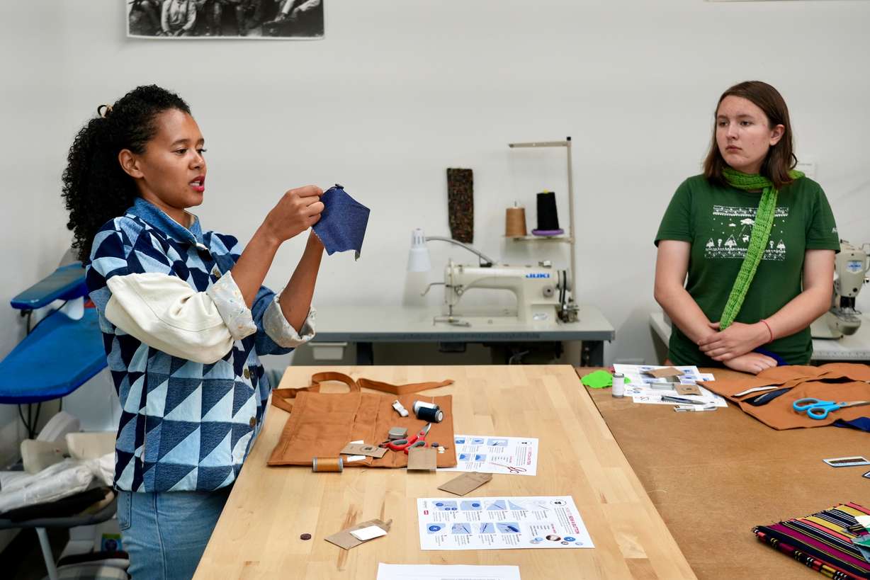 Levi’s employee Ella Fassler Clausen teaches during a sewing workshop at a Levi's retail store in downtown San Francisco, July 22.