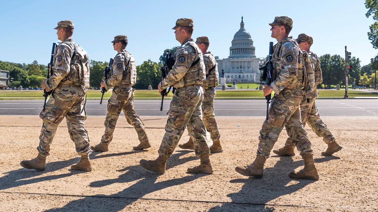 Armed National Guard soldiers from West Virginia patrol the Mall near the Capitol in Washington, as part of President Donald Trump's order to impose federal law enforcement in the nation's capital, Aug. 26, 2025.