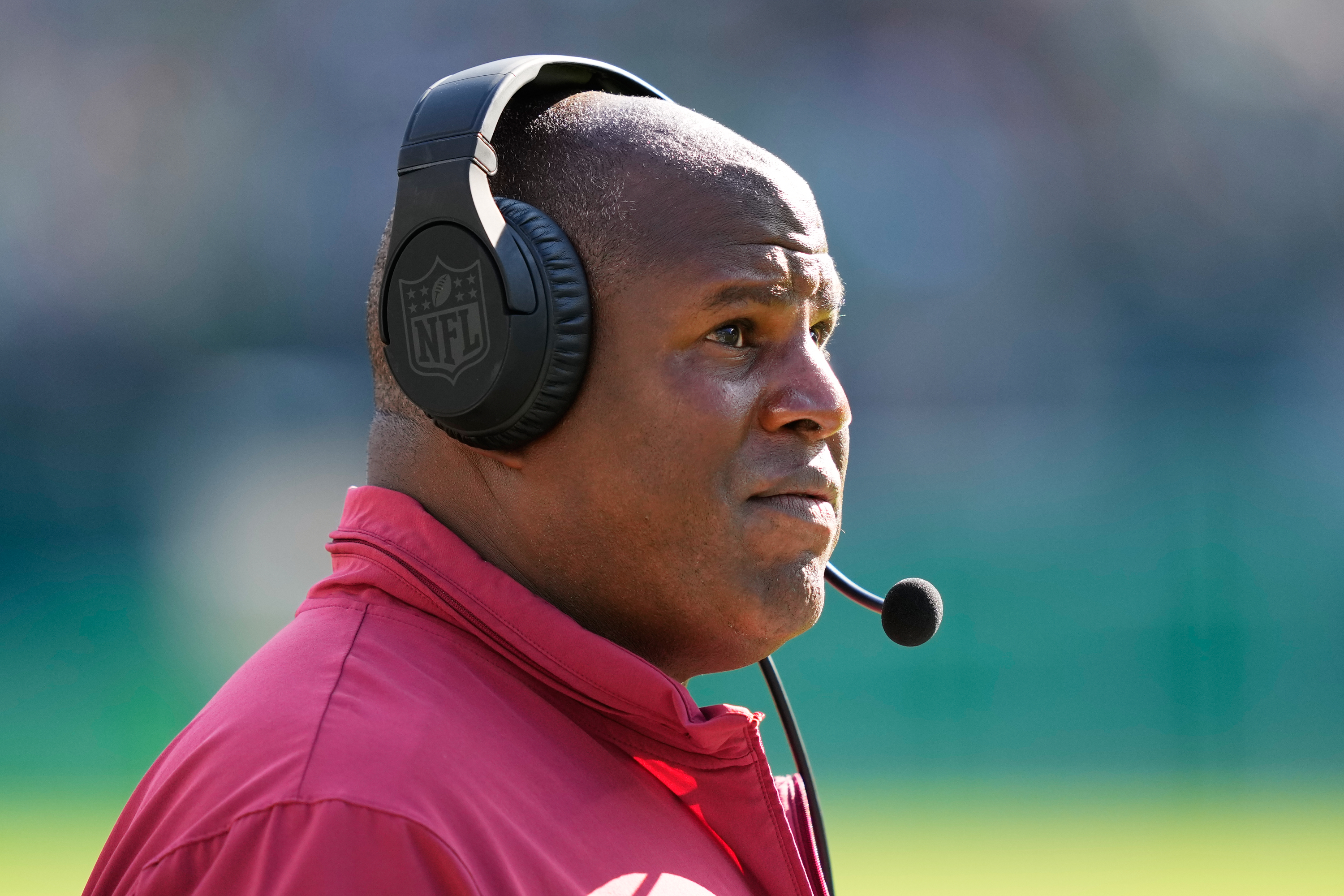 FILE - Washington Commanders offensive coordinator Eric Bieniemy watches from the sidelines during an NFL football game, Oct. 1, 2023, in Philadelphia. 