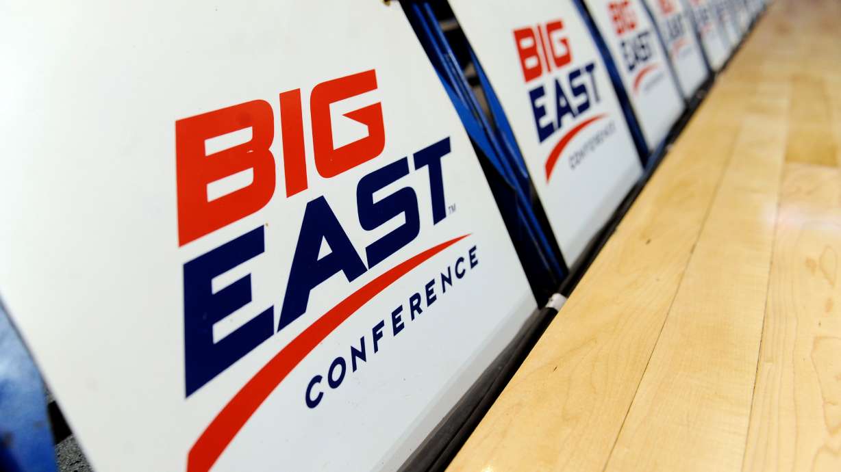 FILE - The logo for the Big East Conference is displayed on a row of court side chairs at the Big East Conference women's basketball tournament in Hartford, Conn., March 8, 2013.