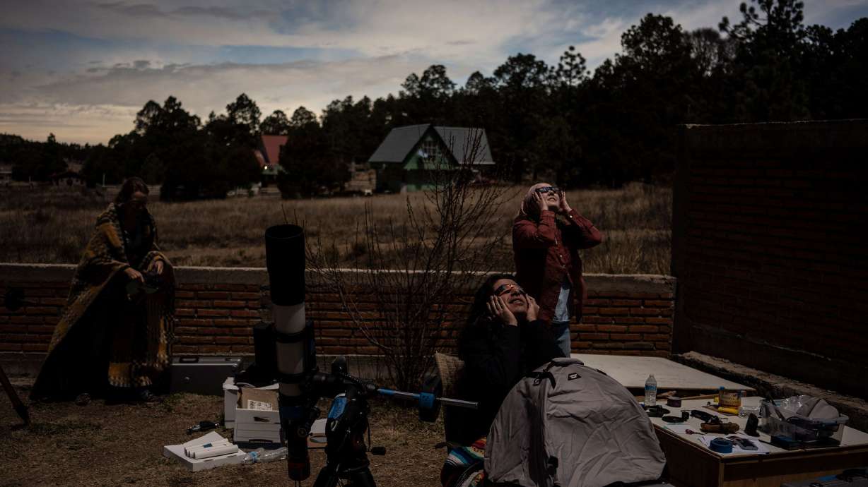 Researchers watch the total solar eclipse in Mexico on April 8, 2024.