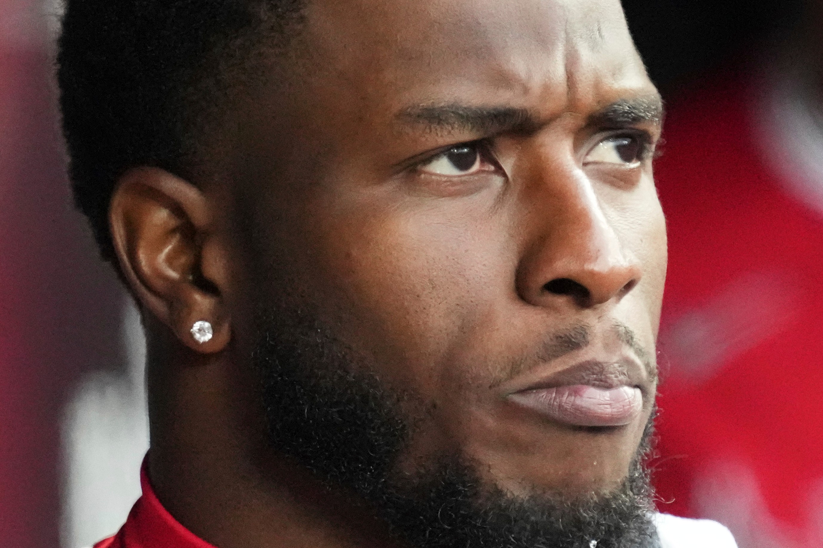 FILE - Tim Anderson, with Los Angeles Angels, looks to the field during the ninth inning of an opening-day baseball game against the Chicago White Sox in Chicago, March 27, 2025. 