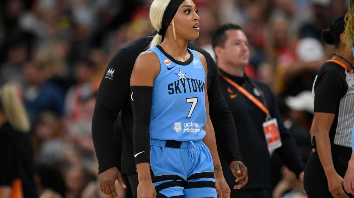 Chicago Sky's DiJonai Carrington walks off the court ejected from the game for committing a flagrant foul against Indiana Fever's Sophie Cunningham during the first half of an WNBA basketball game in Chicago, Saturday, Aug. 8, 2026.