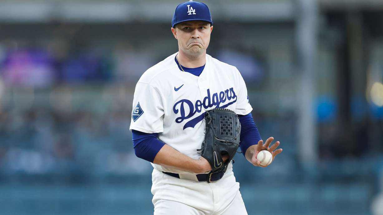 Los Angeles Dodgers starting pitcher Tarik Skubal reacts between batters during the first inning of a baseball game against the Kansas City Royals, Monday, Aug. 10, 2026, in Los Angeles.
