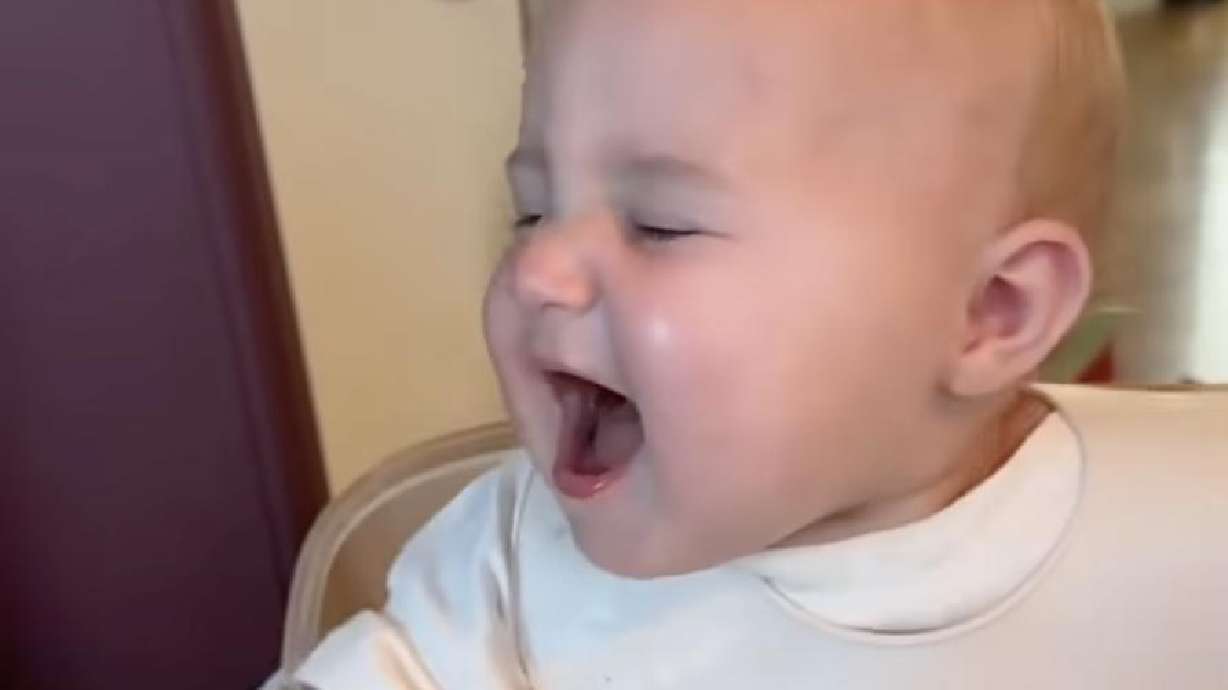 This infant is a natural performer, their "EIEI-O" is sure to make you smile.