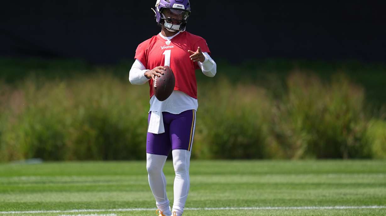 Minnesota Vikings quarterback Kyler Murray stands on the field during the NFL football team's training camp Saturday, Aug. 1, 2026, in Eagan, Minn.