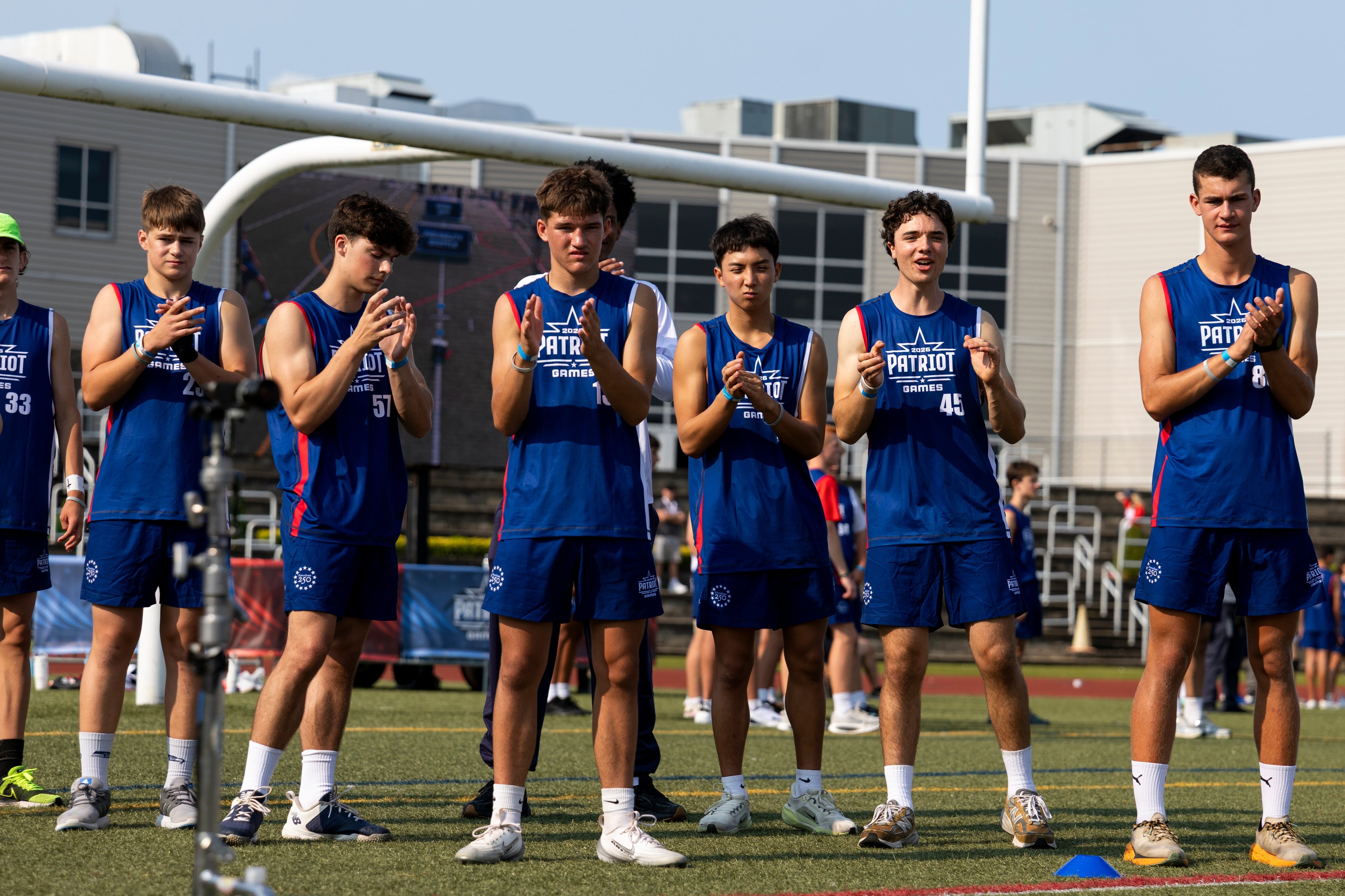 Participants cheer during day one of the Patriot Games, Sunday, in Geneva, Ohio.