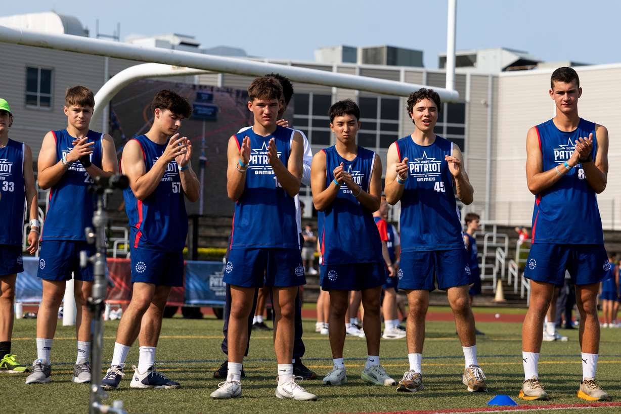 Participants cheer during day one of the Patriot Games, Sunday, in Geneva, Ohio.