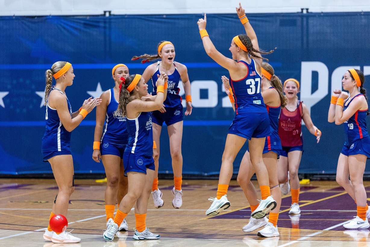 Participants celebrate during Day 1 of the Patriot Games, Sunday, in Geneva, Ohio.