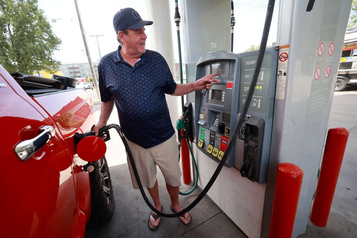 Dale Kinyon gets gas at Shoppers Express in Salt Lake City on Tuesday.