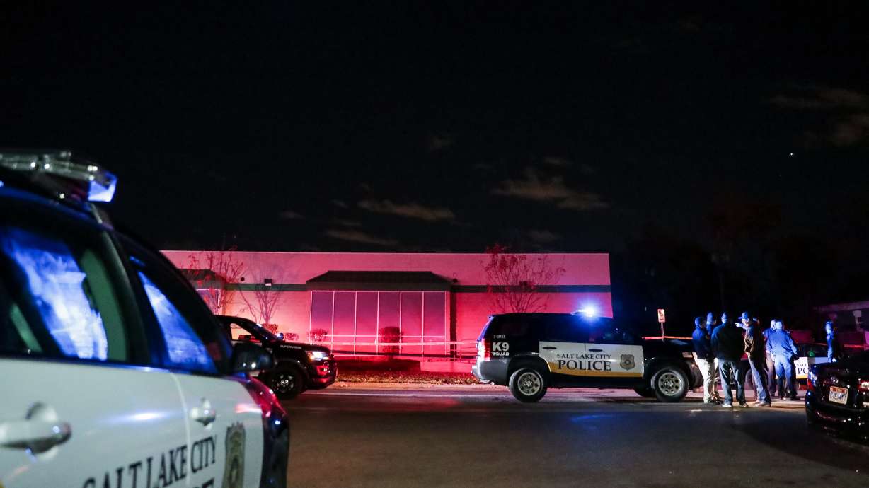 Police work the scene of a stabbing that left one woman dead and another person injured near 500 North and 300 West in Salt Lake City on Wednesday, Nov. 7, 2018.
