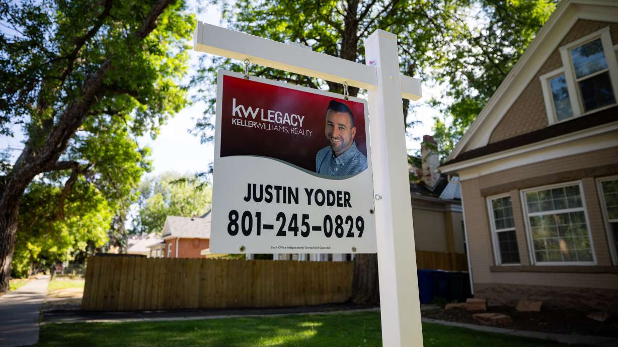 A realty sign in the 9th and 9th neighborhood in Salt Lake City on July 23. There are deals to be made in this year's late summer housing market, when many buyers are making a final push to find a new home before school starts.