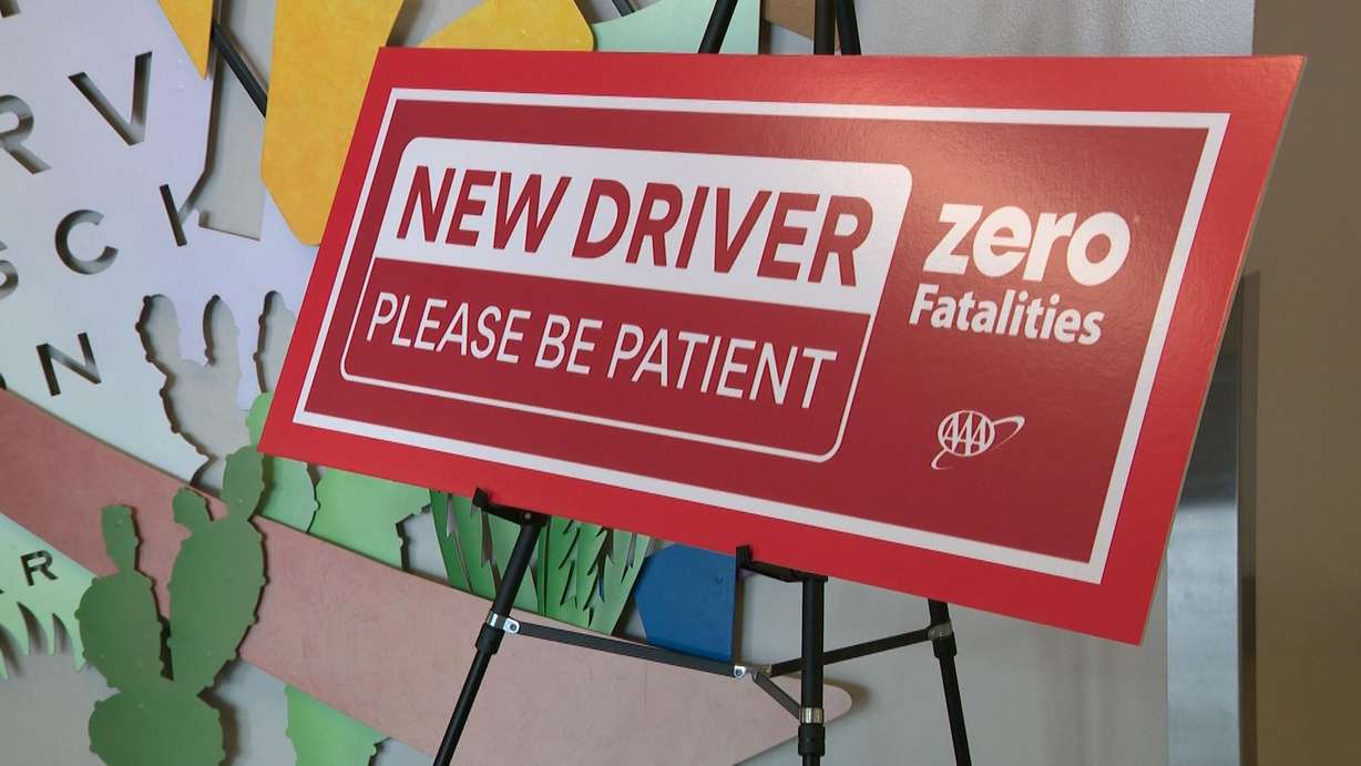 A "Please Be Patient" sign is pictured.