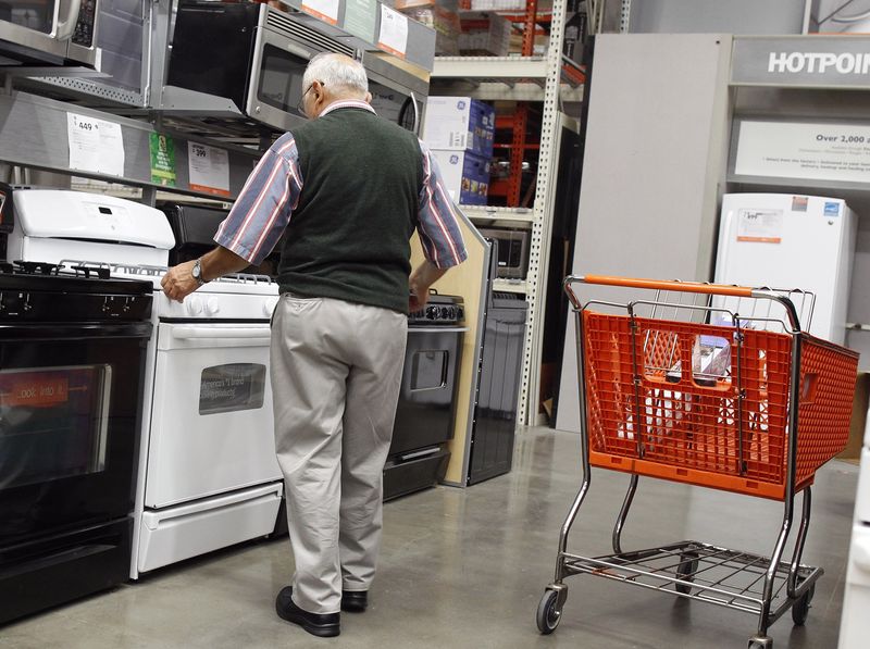 A man shops for an oven at a Home Depot store in New York, July 29, 2010.