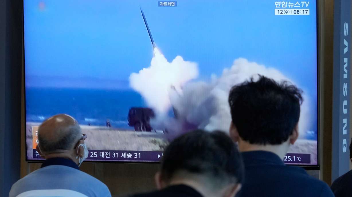 A TV screen shows a file image of North Korea's missile launch during a news program at Seoul Railway Station in Seoul, South Korea on Wednesday.