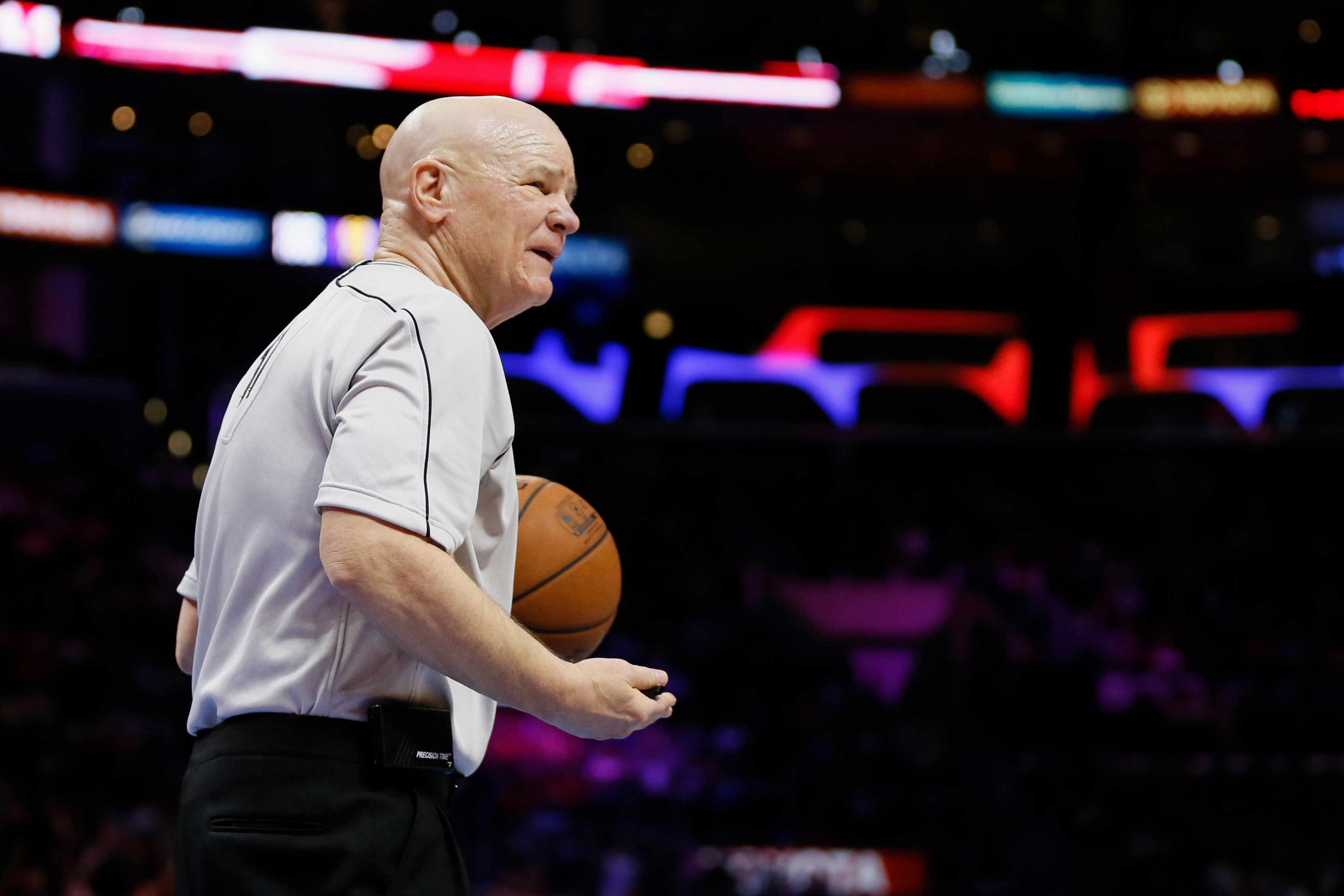 FILE - NBA official Joey Crawford is seen during an NBA basketball game between the Los Angeles Clippers and Milwaukee Bucks, Dec. 20, 2014, in Los Angeles. 