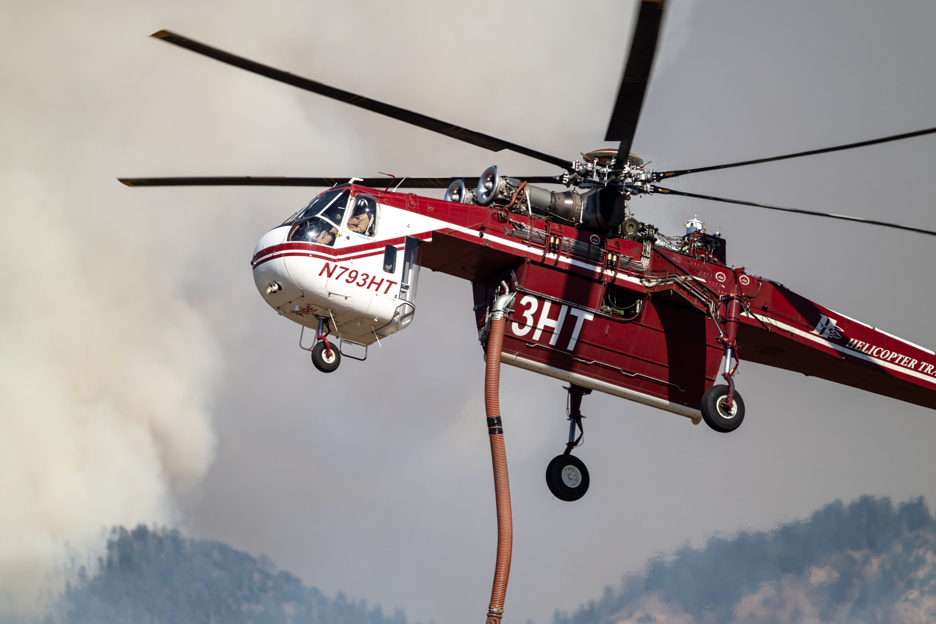 A Sikorsky Skycrane approaches to refill as crews fight the Widemouth 2 Fire east of Fillmore, on Aug. 4. Utah's congressional and local leaders paid tribute to the firefighters who died fighting the Widemouth 2 Fire last week.