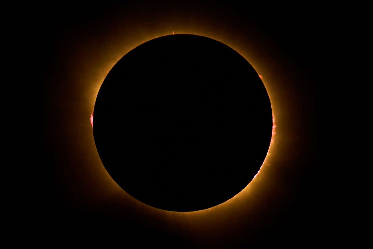 A total solar eclipse is seen from Berlanga de Duero, central Spain, Wednesday. Millions crowded into towns and cities nationwide to catch a view of the eclipse.