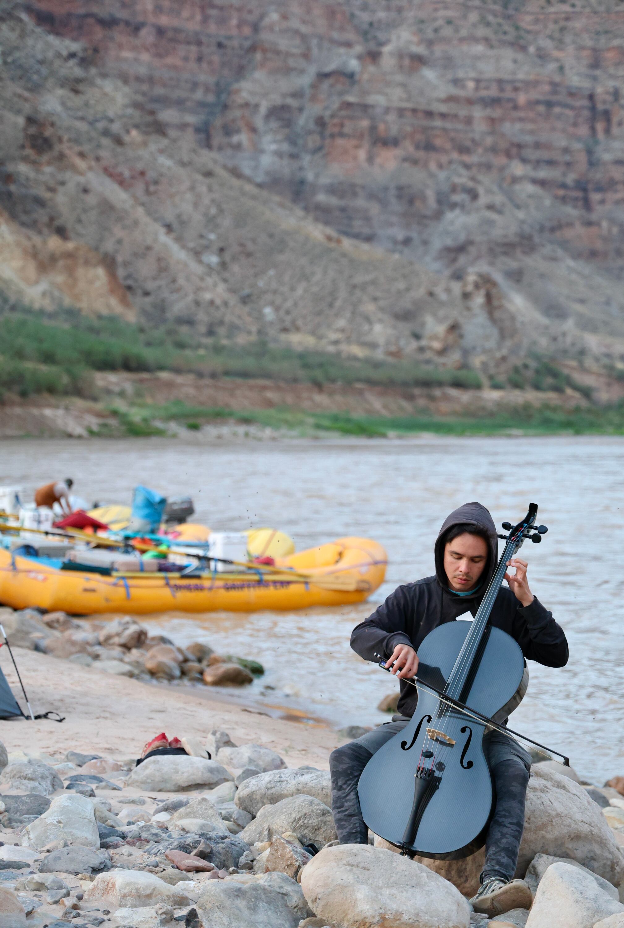 Jay Campbell performs along the banks of the Colorado River during the 2025 Moab Music Festival.