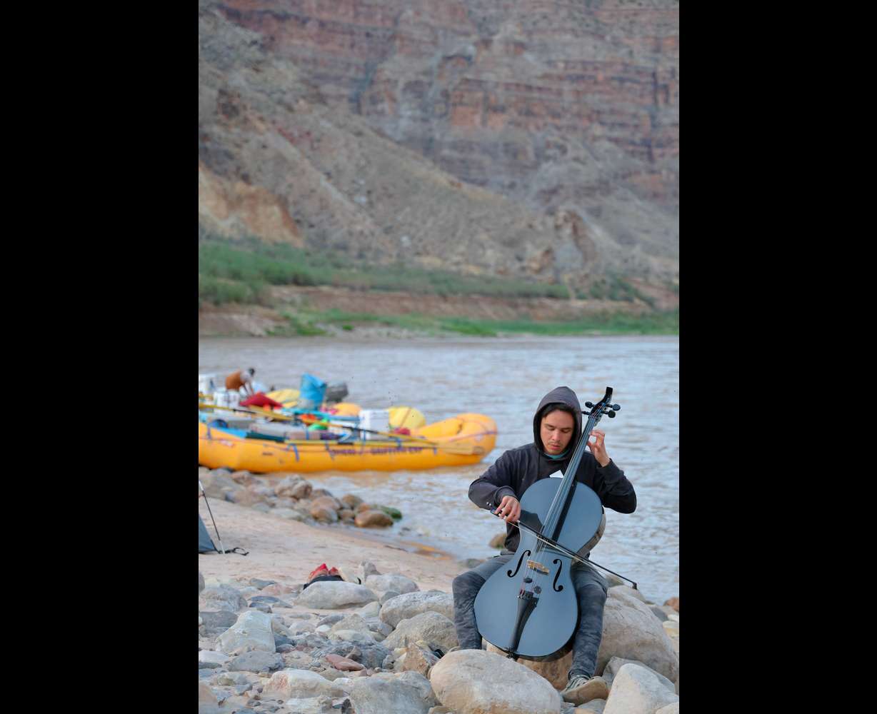 Jay Campbell performs along the banks of the Colorado River during the 2025 Moab Music Festival.