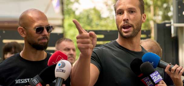 Judge postpones hearing on Tate brothers staying in custody as they fight extradition