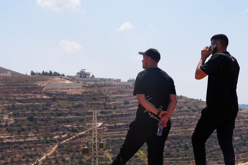 Israel sends troops into West Bank homes besieged by Jewish settlers