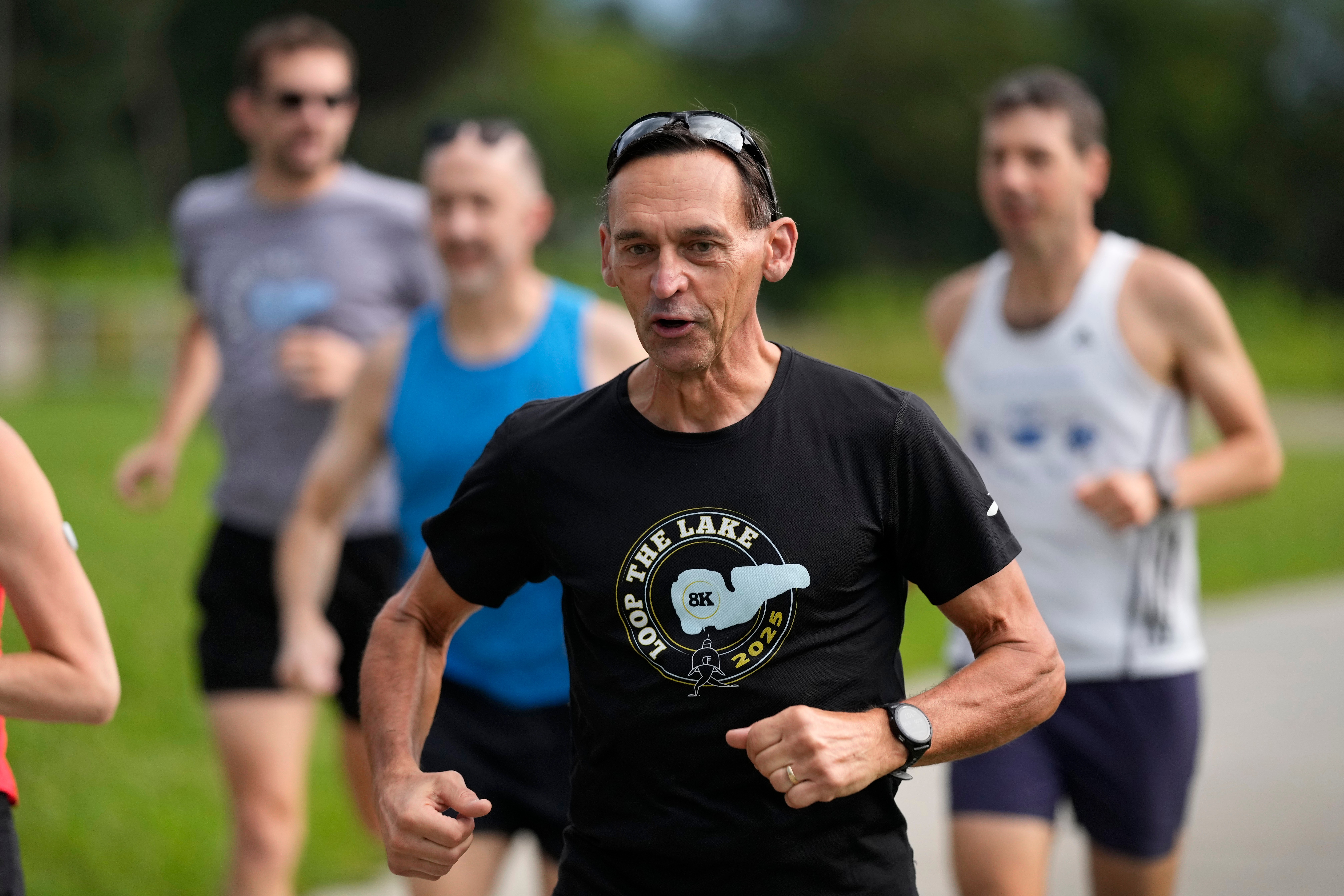 Paul Grinvalds, of West Des Moines, Iowa, runs with the Raccoon River Running Club, Sunday, Aug. 9, 2026, in West Des Moines, Iowa. 
