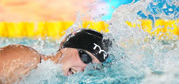 Katie Ledecky surges to 1,500 free win for her first home-soil international medal