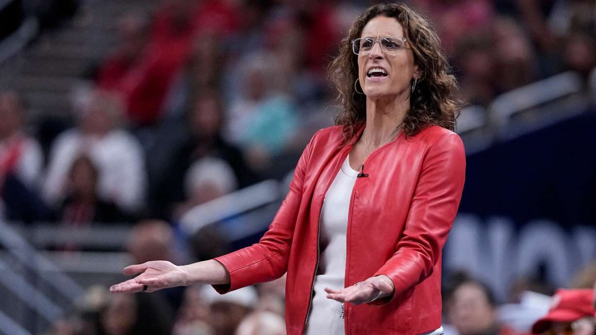 Indiana Fever head coach Stephanie White questions a call in the second half of a WNBA basketball game against the New York Liberty in Indianapolis, Tuesday, Aug. 11, 2026.