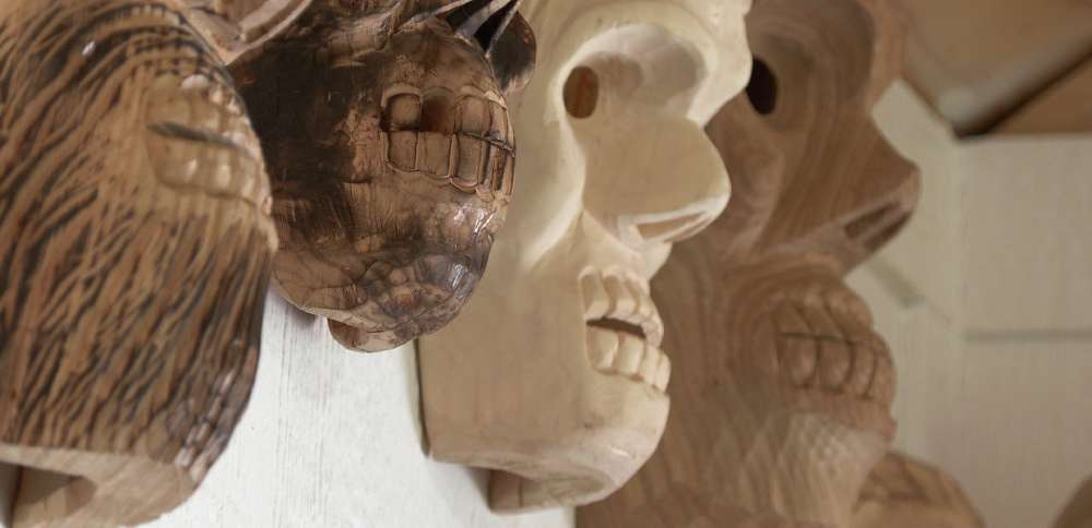 The man behind the masks