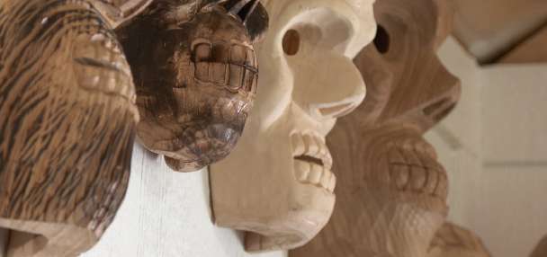 The man behind the masks