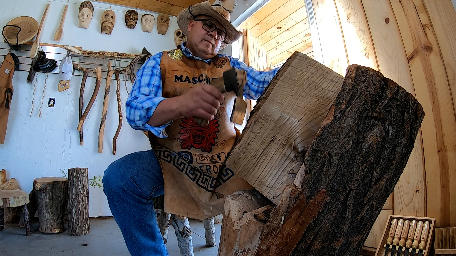 Jesus Cuevas creates traditional Mexican masks in his workshop in Farr West on June 23.