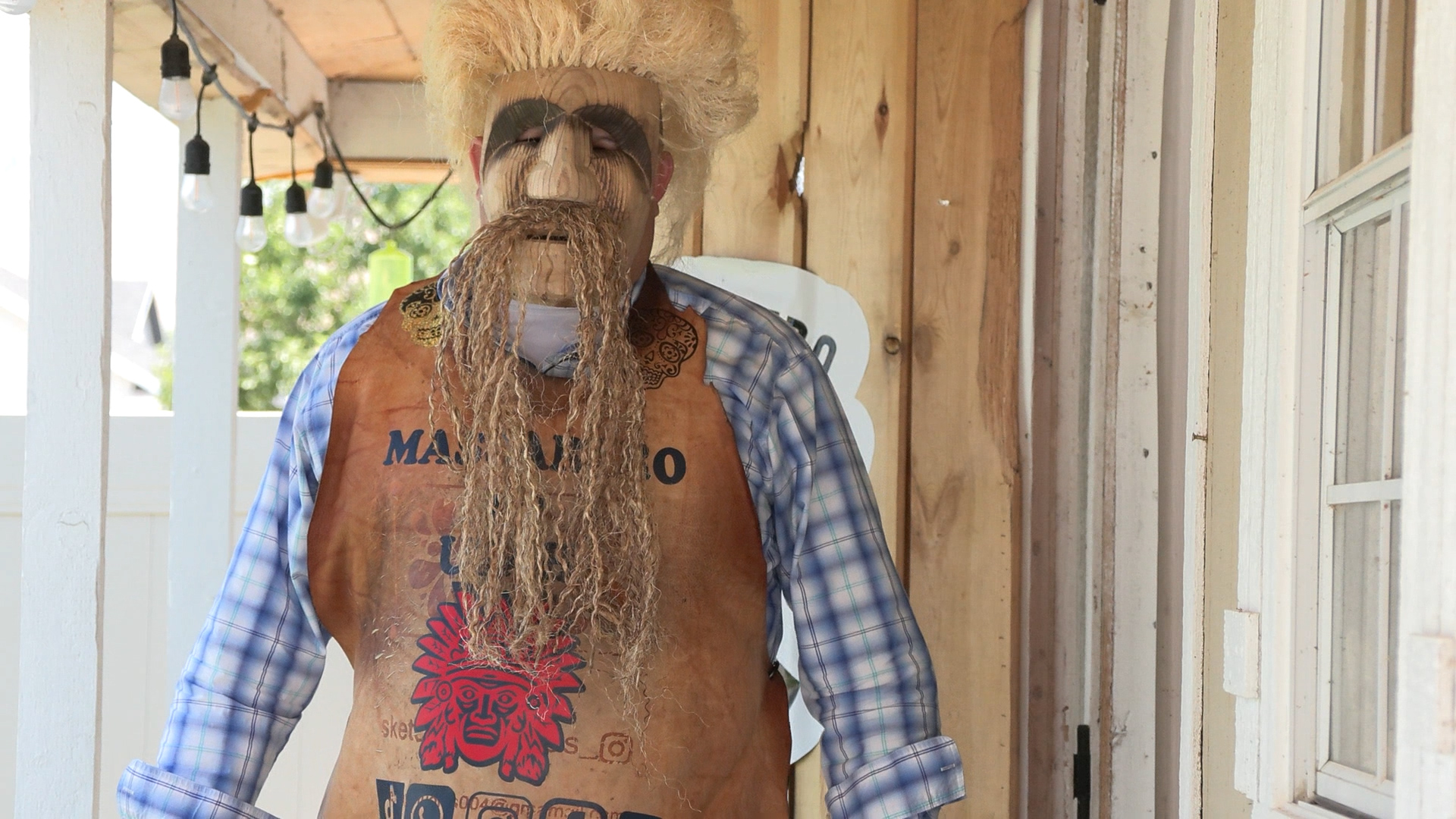 Jesus Cuebas wears a mask he made for The Dance of the Tastoanes in the June 23 photo.