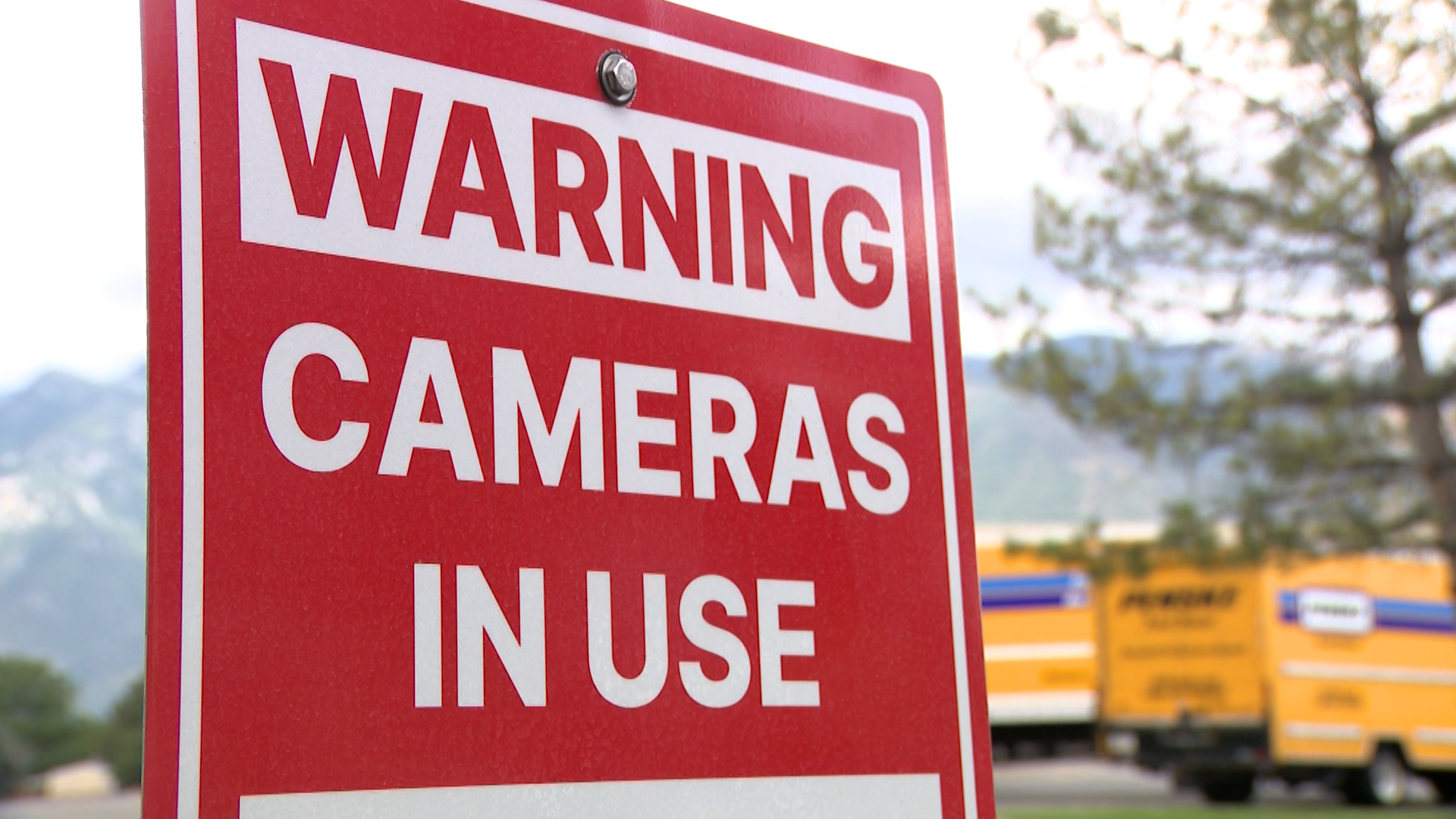 A "warning cameras in use" sign is pictured in Salt Lake City on Thursday.
