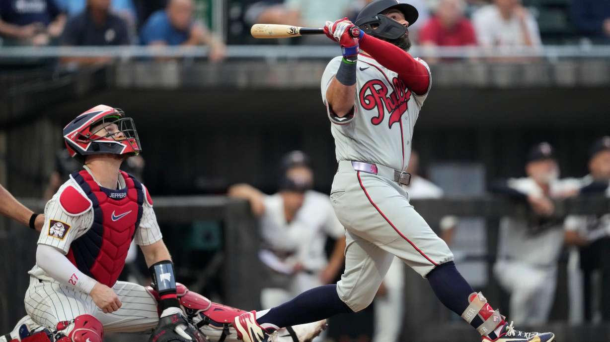 Philadelphia Phillies' Kyle Schwarber hits a home run during the fourth inning of a baseball game against the Minnesota Twins at the Field of Dreams movie site, Thursday, Aug. 13, 2026, in Dyersville, Iowa.