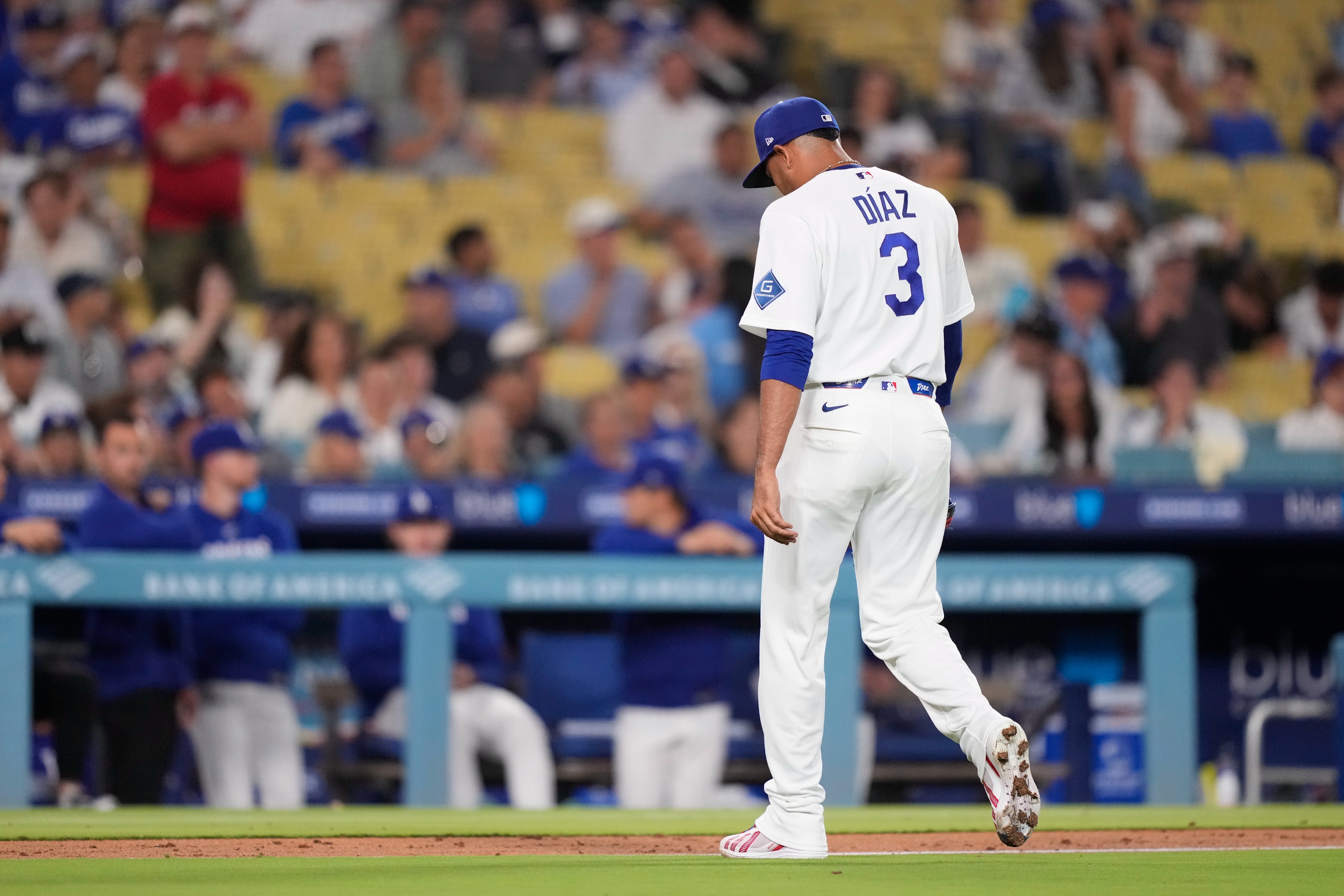 Los Angeles Dodgers pitcher Edwin Díaz walks off the field after being taken out of the game during the ninth inning of a baseball game against the Milwaukee Brewers, Thursday, Aug. 13, 2026, in Los Angeles. 