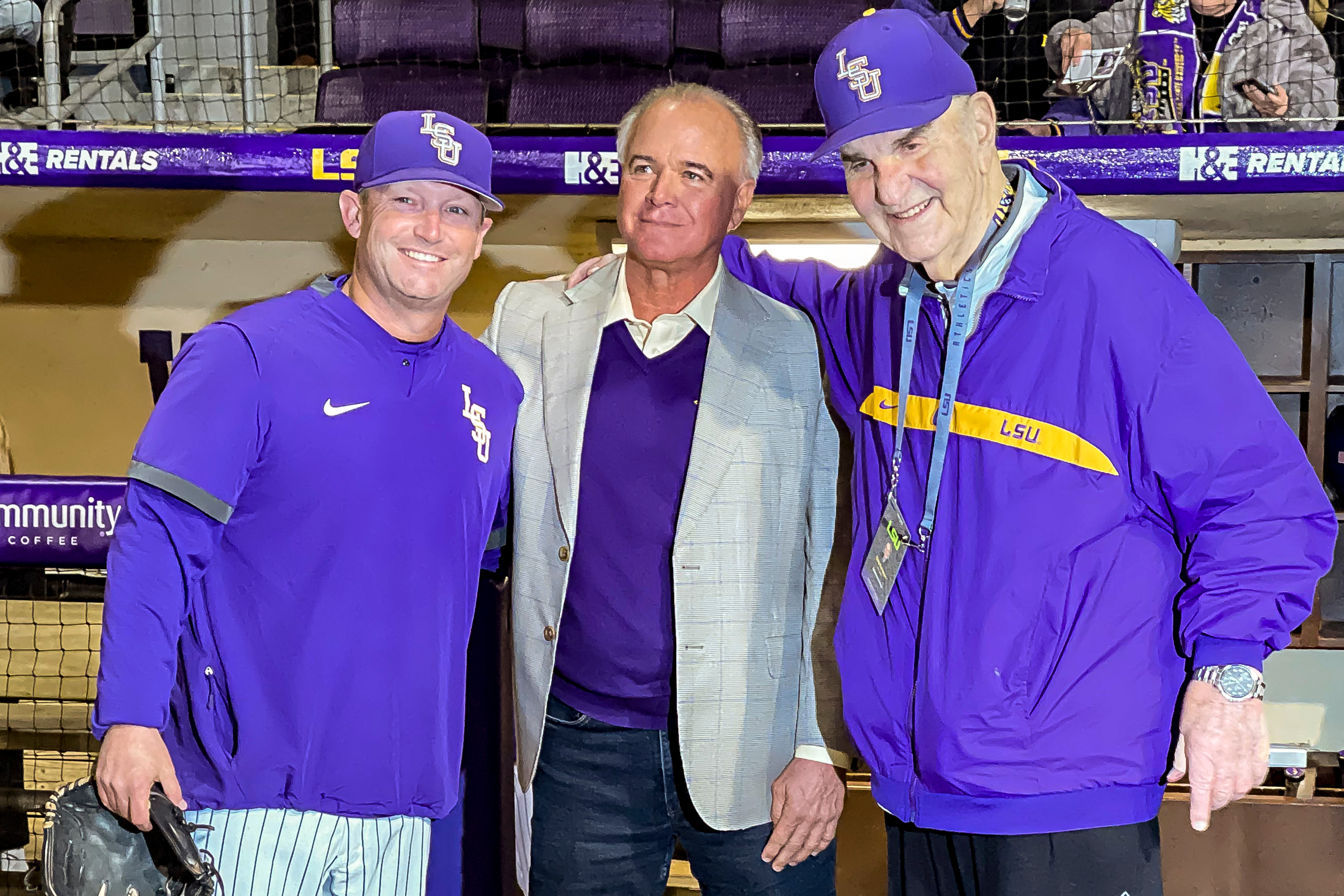 FILE - LSU head coach Jay Johnson, left, smiles with retired head coach Paul Mainieri, and head coach Skip Bertman before an NCAA baseball game against Maine on Feb. 18, 2022, in Baton Rouge, 